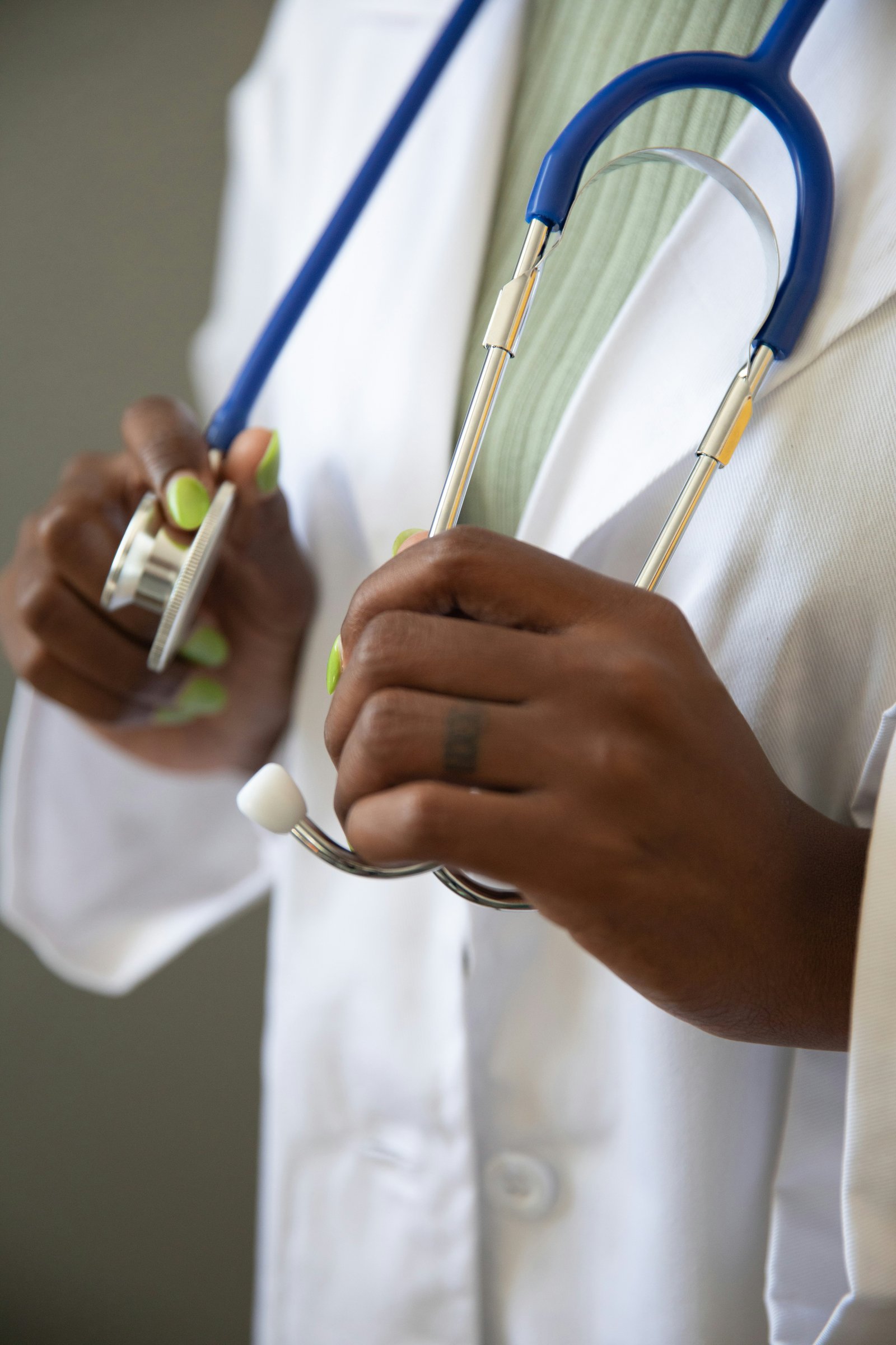 Healthcare professional with a stethoscope representing our medical mission