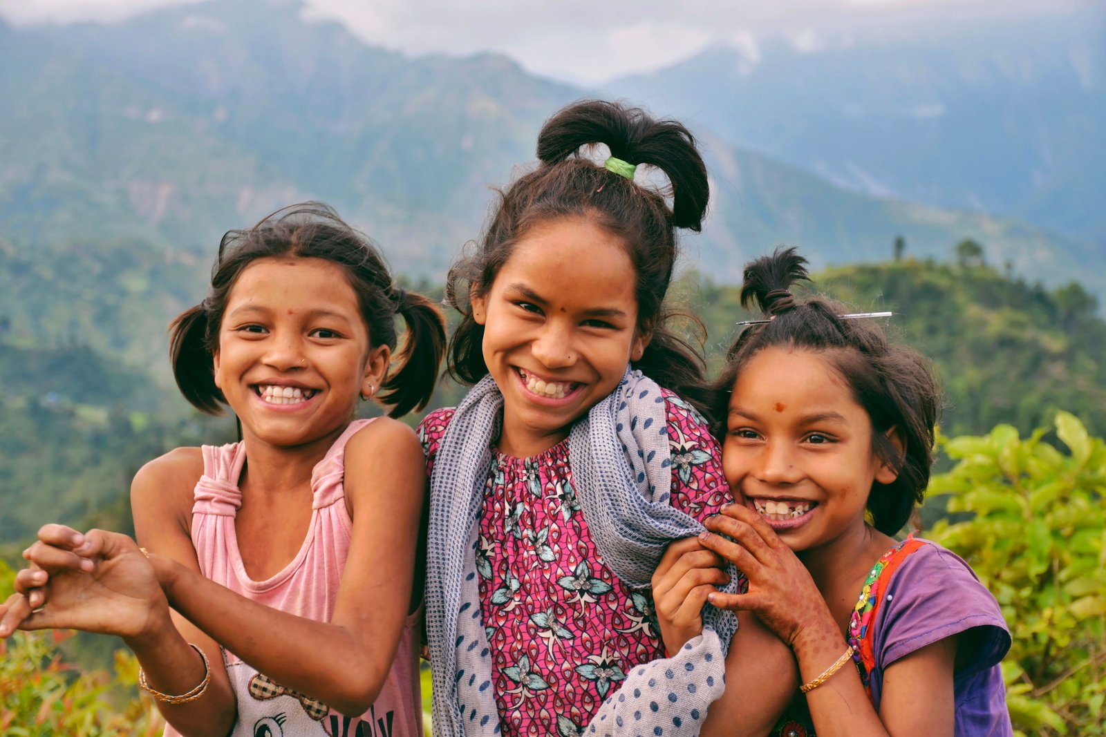 Young girls smiling together outdoors