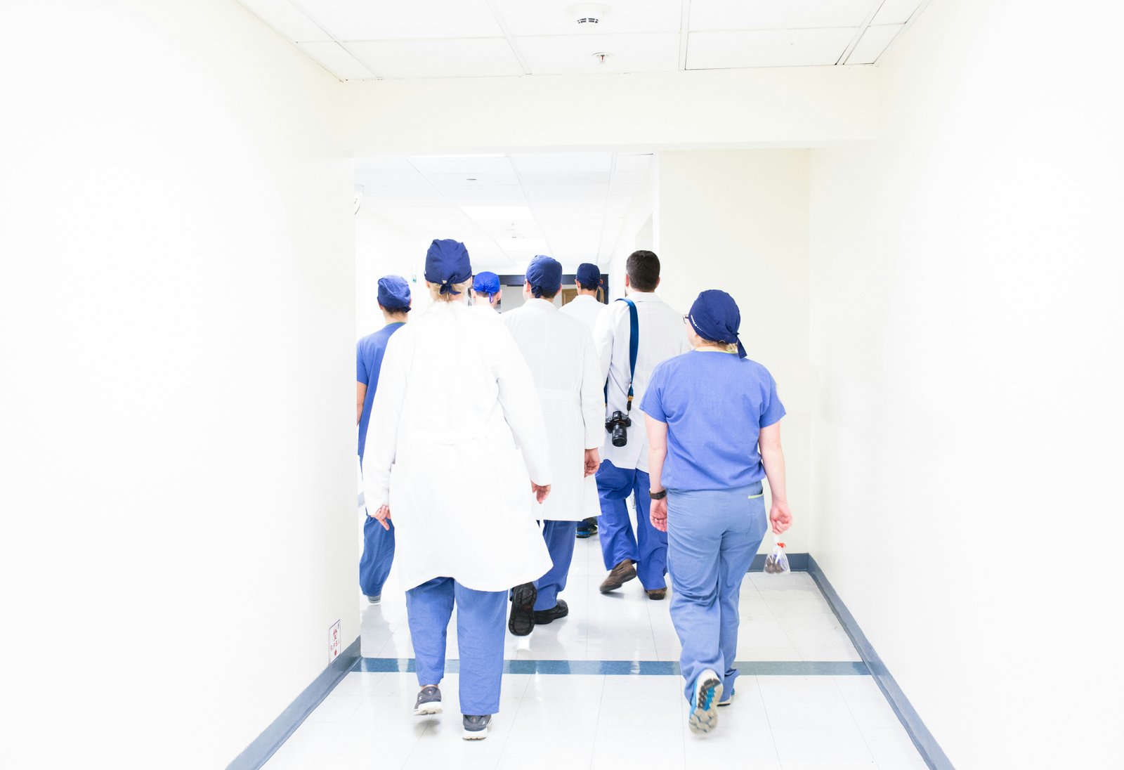 Medical team walking through a hospital corridor